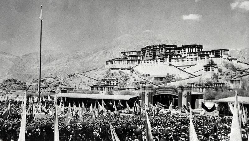 Tibetans gather during the armed uprising against Chinese rule March 10, 1959 in front of the Potala Palace in Lhasa, the capital of Tibet.